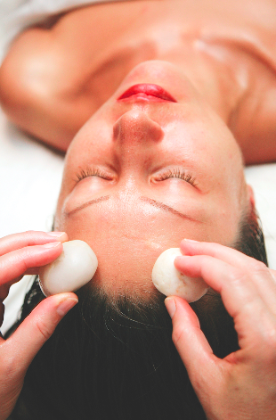 Hot Stone Facial therapy